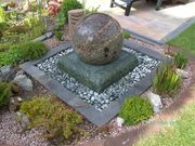 ball water feature, stone water feature, sphere fountain, rolling ball 