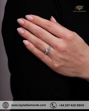 A timeless round ring with diamonds crafted for heartfelt moments