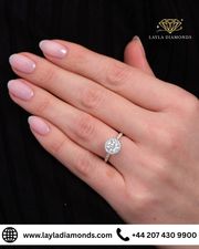 Graceful Sparkle in a Modern Round Engagement Ring